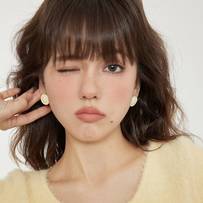 ミルクフードインス円盤銀ピアス