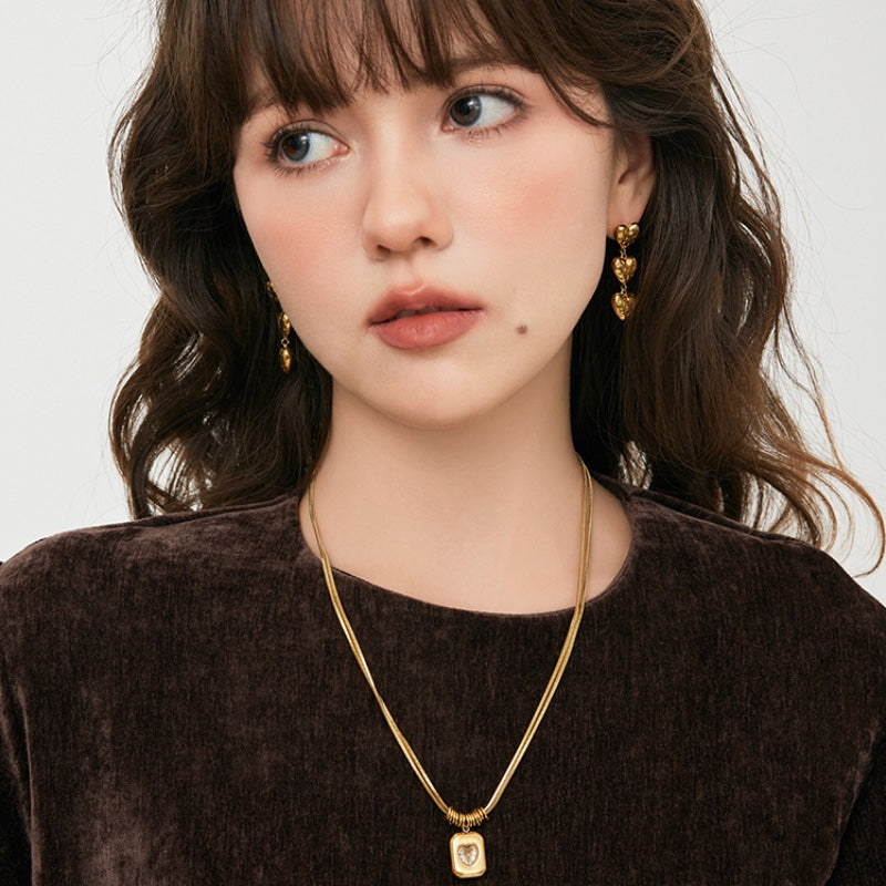 潮汐ハートテクスチャ 18K メッキチタンピアス