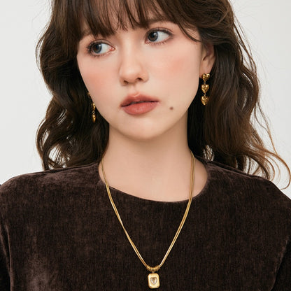 潮汐ハートテクスチャ 18K メッキチタンピアス