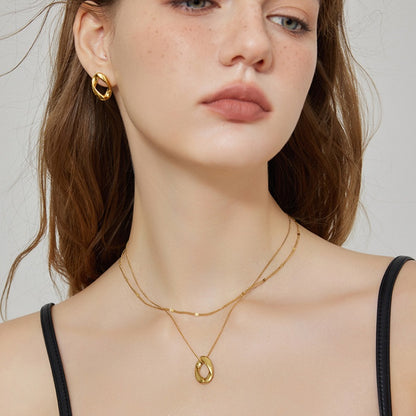 楕円チタンスチール 18K 金メッキイヤリング